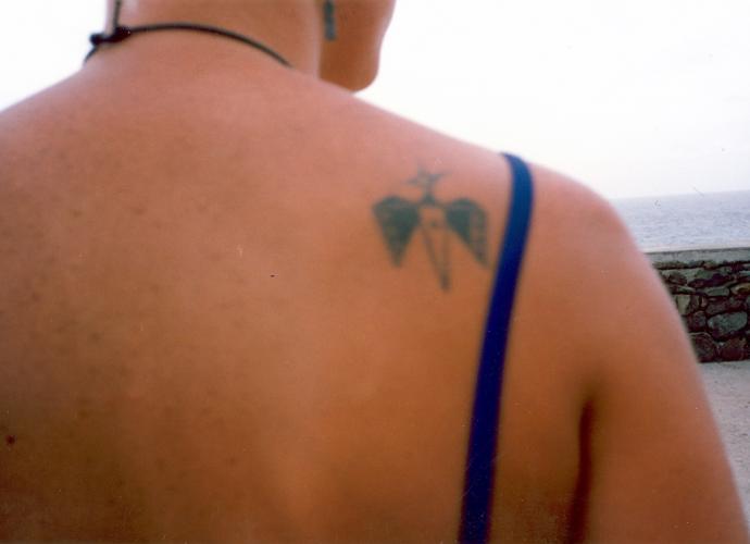 Jennifer's new tattoo, Oahu 1994